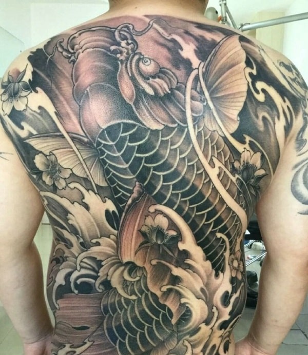 Full back black and white carp tattoo