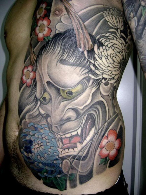 Devil face tattoo